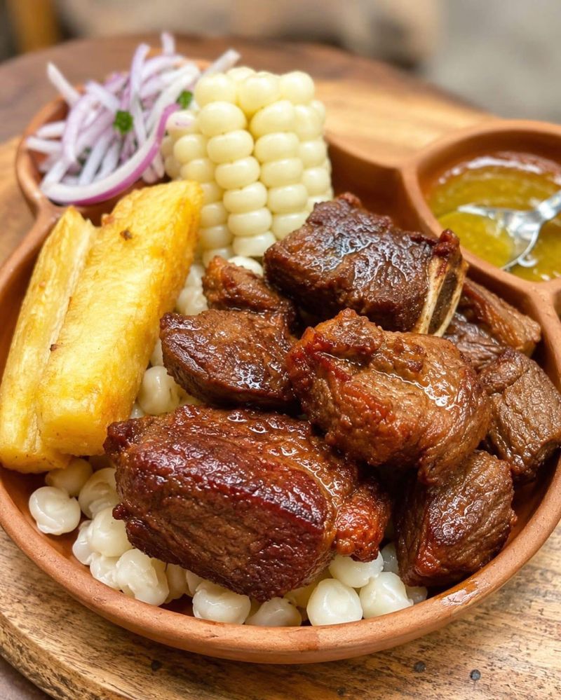 Chicharrón with choclo and yuca